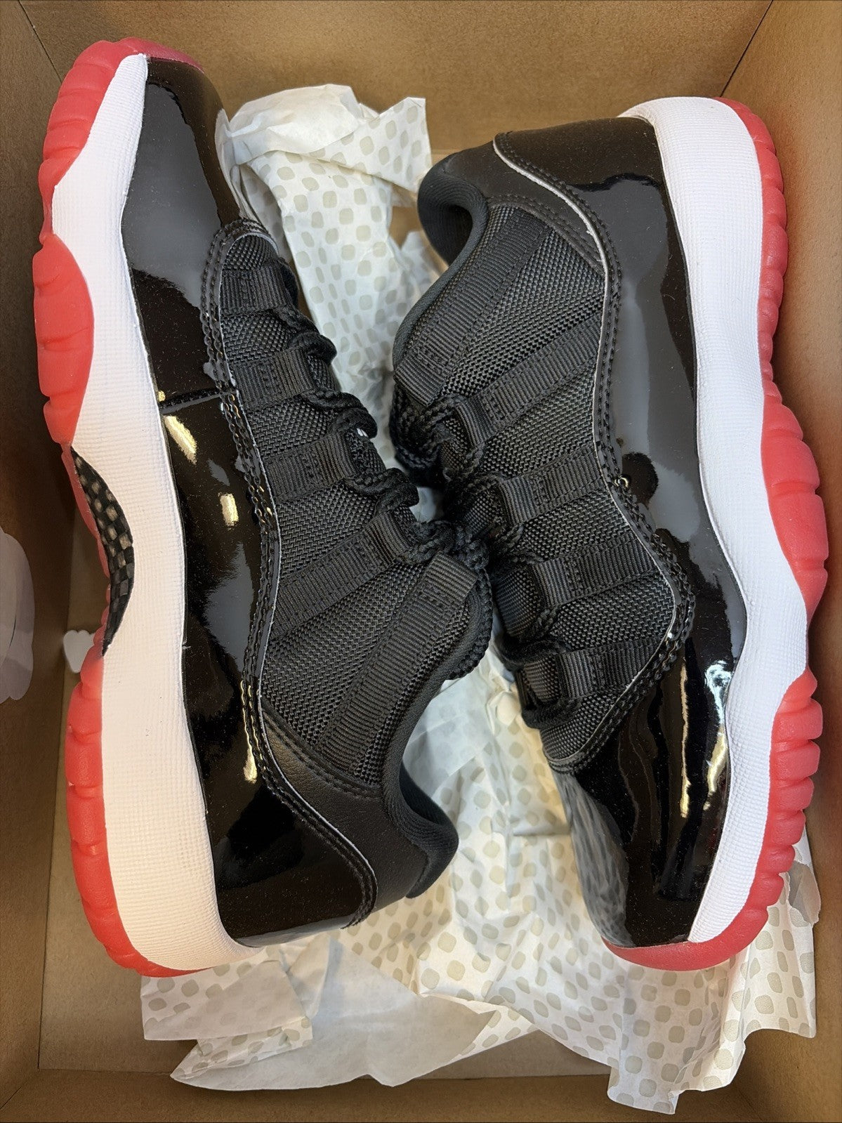 Size 5.5y - Air Jordan 11 Retro 2025 Low Bred0