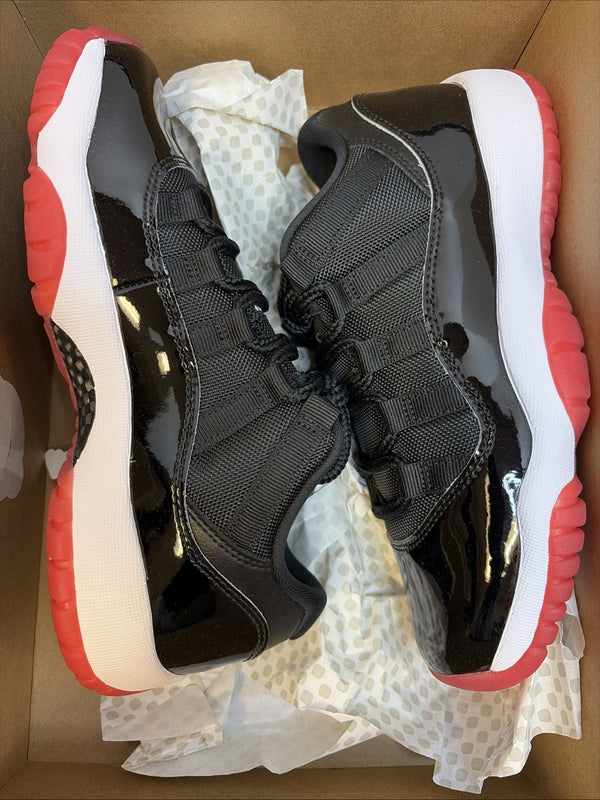 Size 5.5y - Air Jordan 11 Retro 2025 Low Bred0